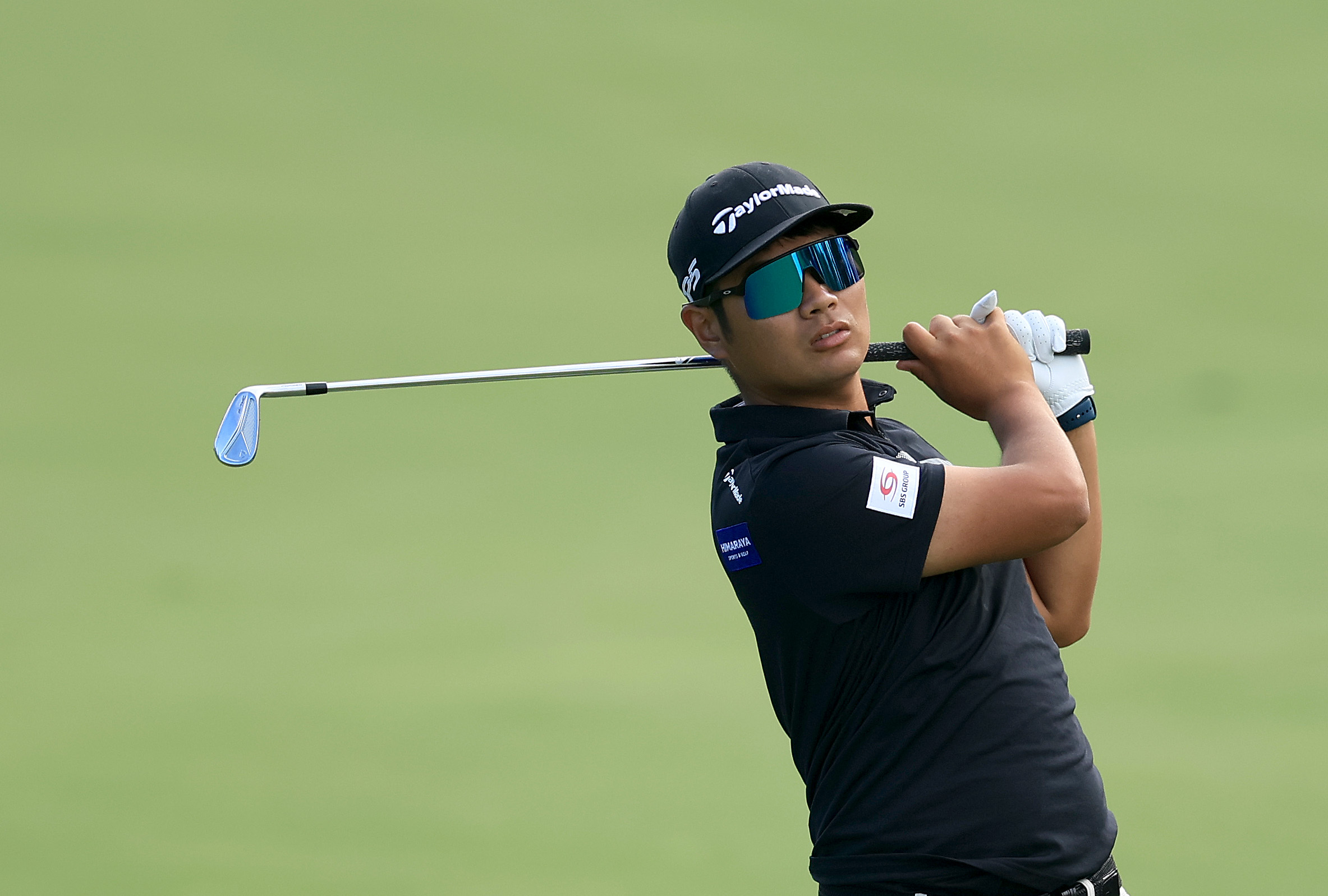 Ryo Hisatsune of Japan plays a shot during the pro-am as a preview for the DP World Tour Championship on the Earth Course at Jumeirah