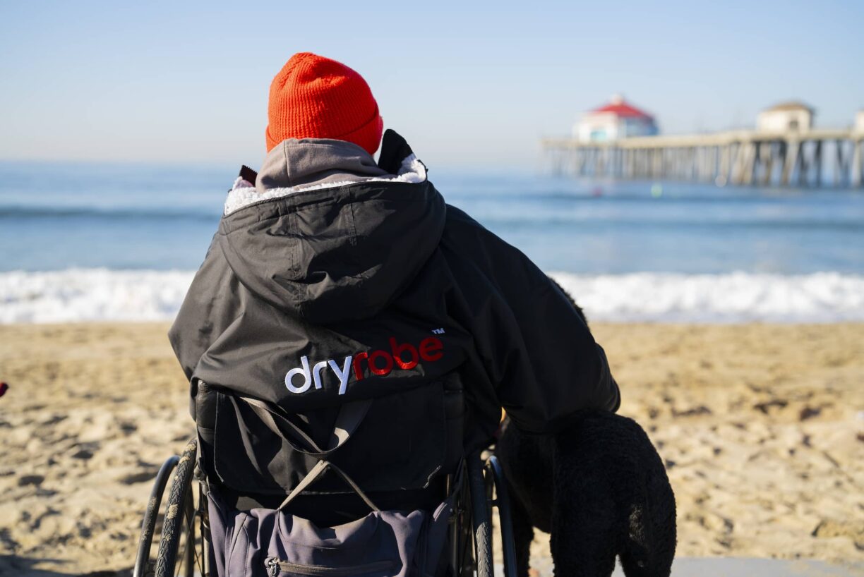 person in wheelchair wears dryrobeAdapt