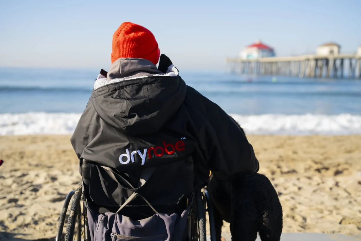 person in wheelchair wears dryrobeAdapt