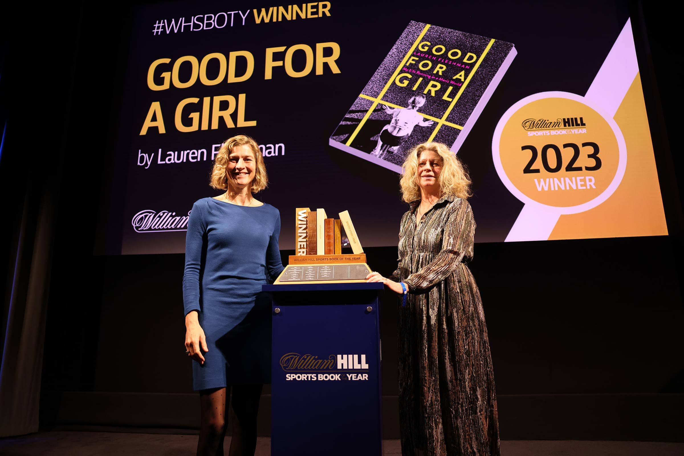 Lauren Fleshman, left, receives the 2023 William Hill Sports Book of the Year Award from chair Alyson Rudd. She wins a £30,000 prize for her book, Good for a Girl My Life Running in a Man’s World