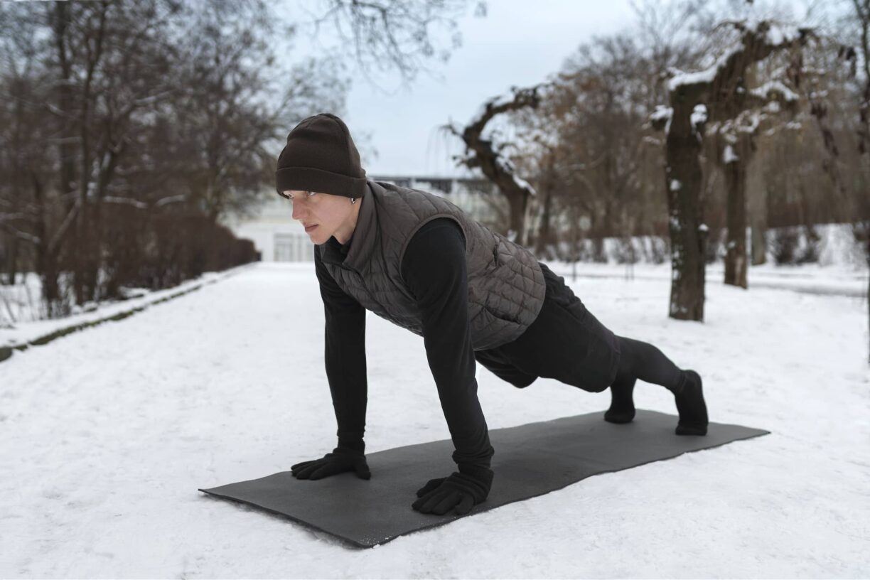 man doing yoga in cold weather