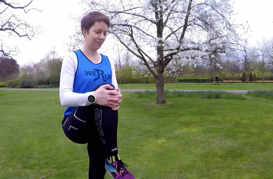 Woman in park stretches