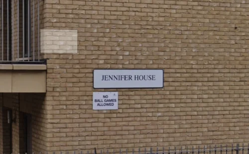 NO BALL GAMES Sign on wall