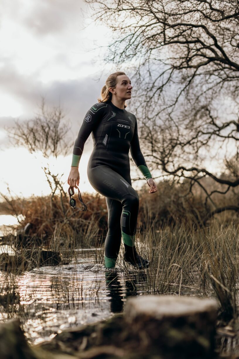 Swimmer wears Zone3 Biodegradable WetSuit