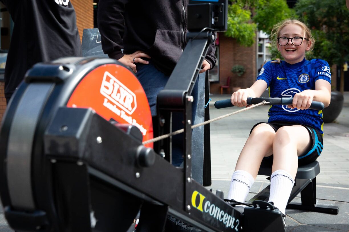 Youngster on rowing machine