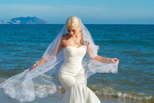 Bride on beach by the sea