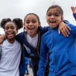 children smiling in playground