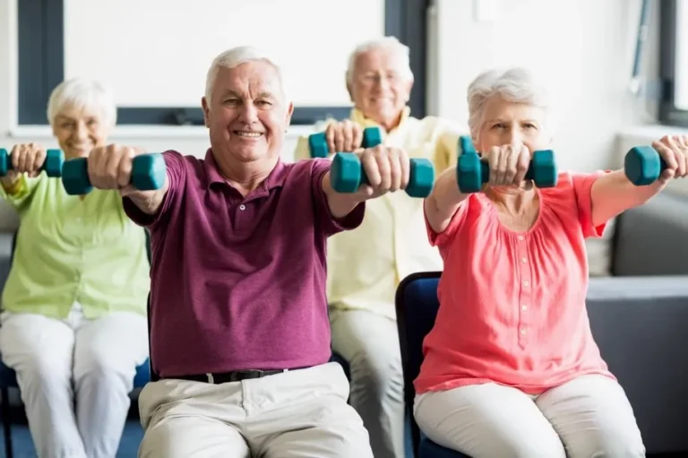 Older people lift dumbbells