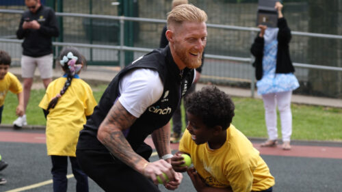 Ben Stokes plays sport with a youngster