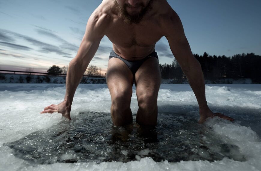 Person climbs into Ice hole