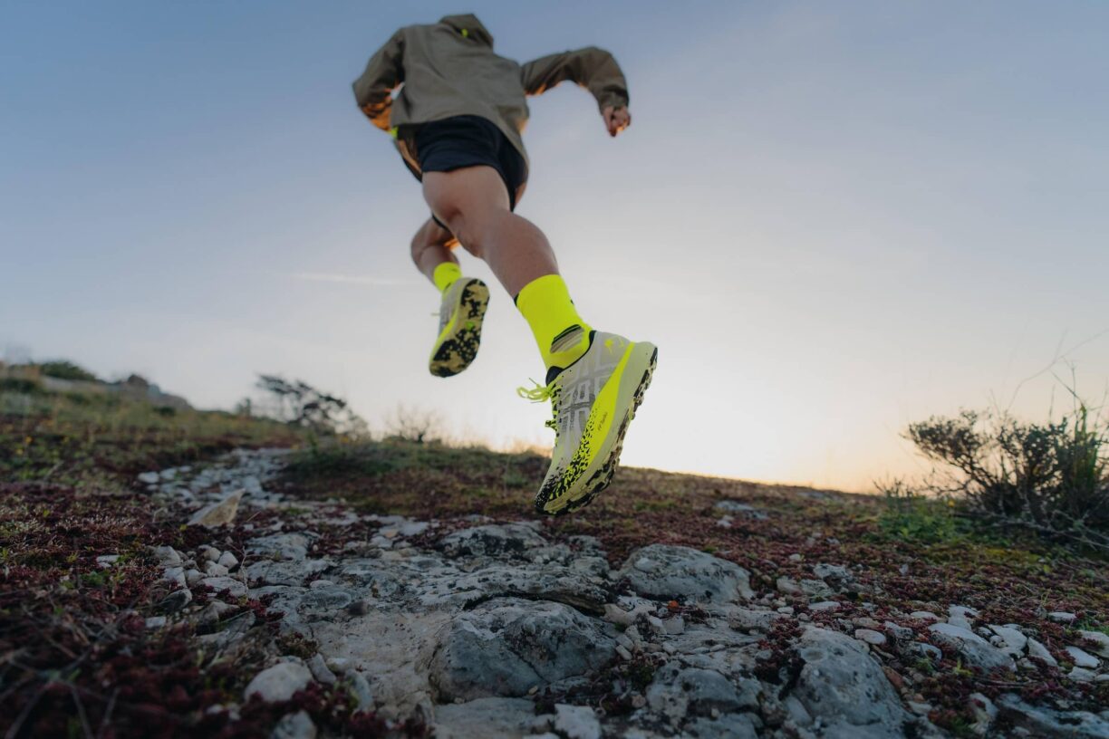 Andreu Simon running in ASICS Trail Shoes