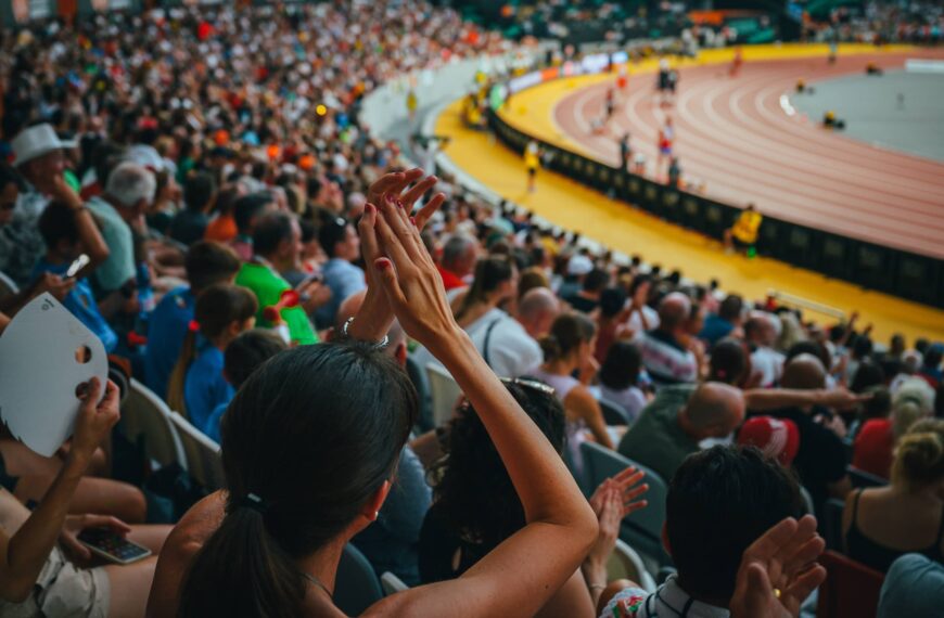 Fans support athletes at the track and field race