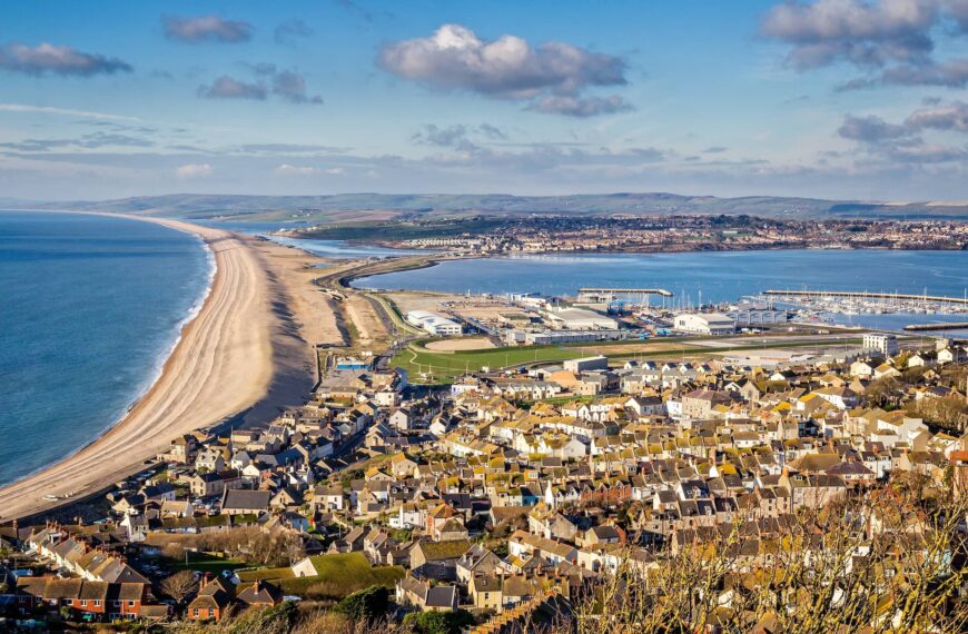 Seascape of Chesil beach and Portland harbour looking towards Weymouth, Dorset