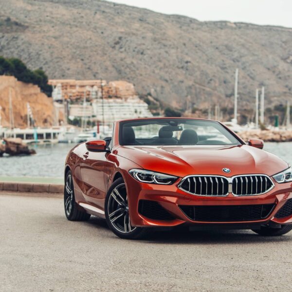 BMW 8 series G14 convertible at the parking of a sea shore