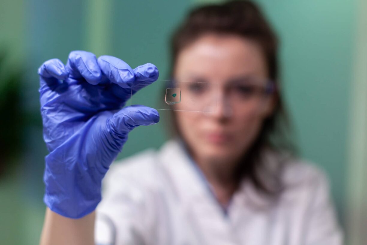 portrait-biologist-scientist-woman-looking-microscope