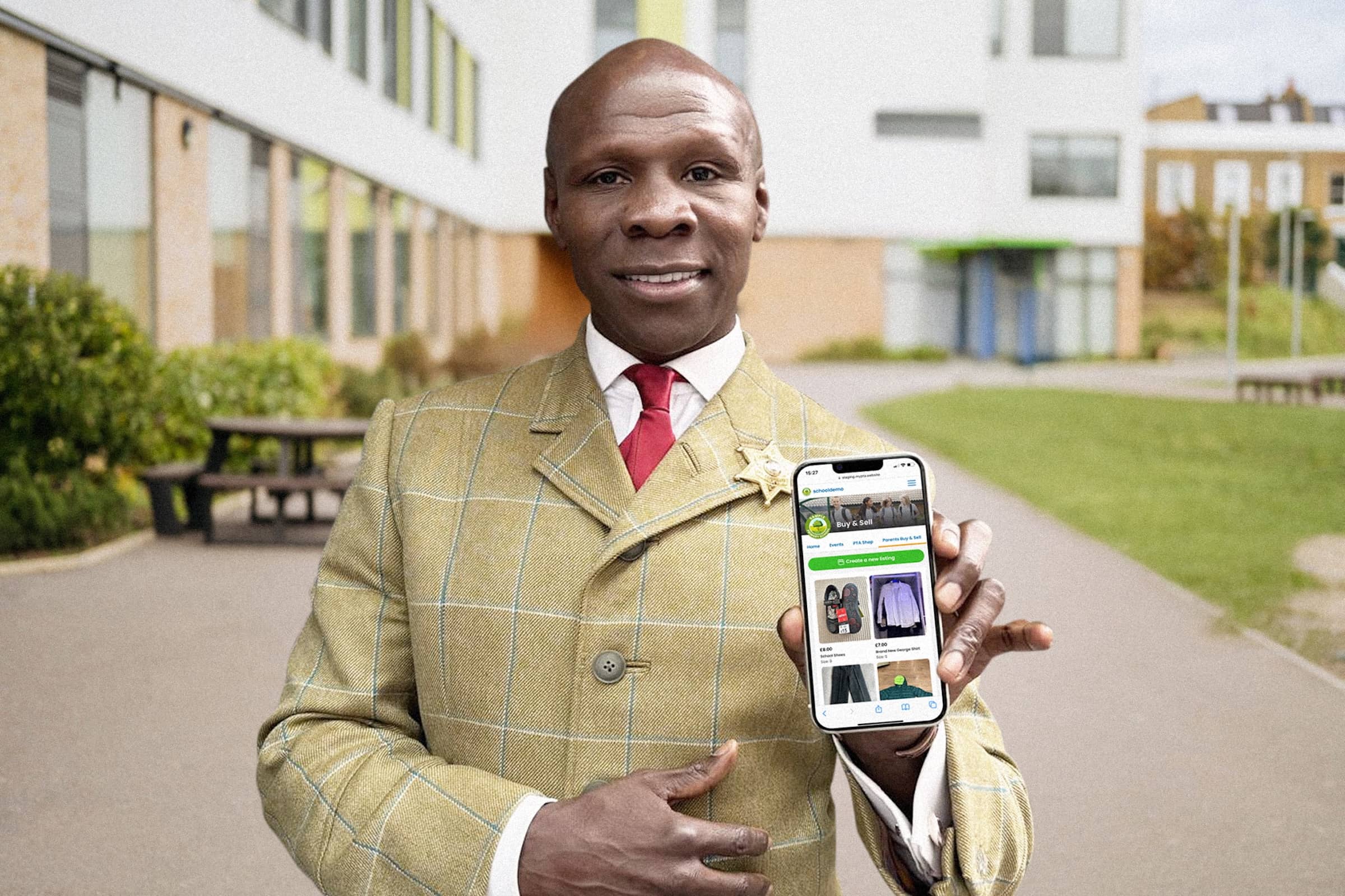 Chris Eubank with Trust Huddle phone app