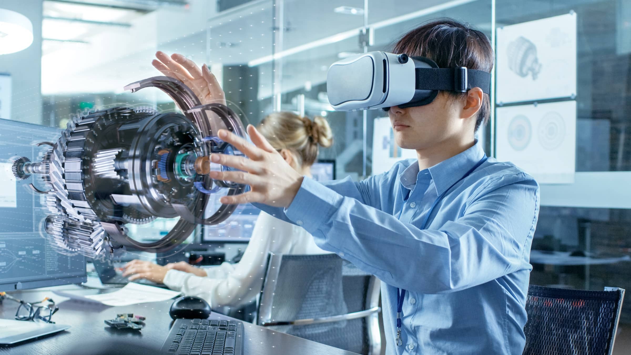 Computer Science Engineer wearing Virtual Reality Headset Works with 3D Model Hologram Visualisation