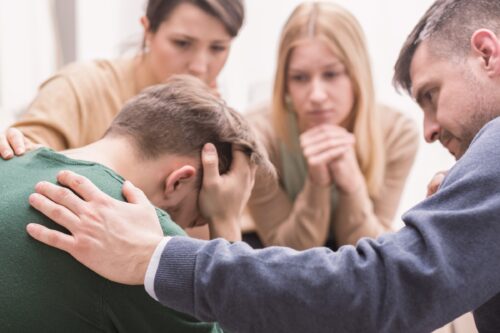 Family-supporting-each-other-during-group-therapy