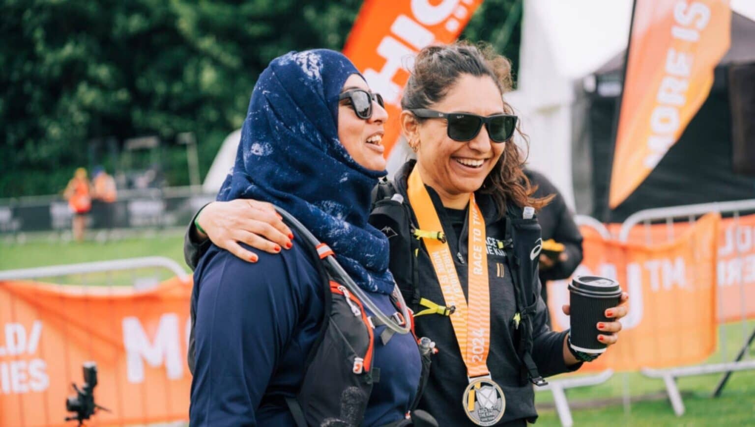 Women congratulate each over after marathon race