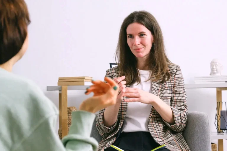 woman talks to psychiatrist