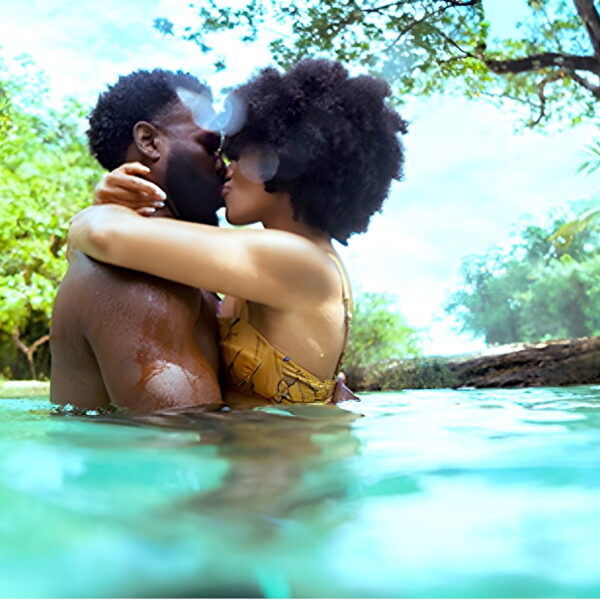 Couple kiss in Jamaican waters