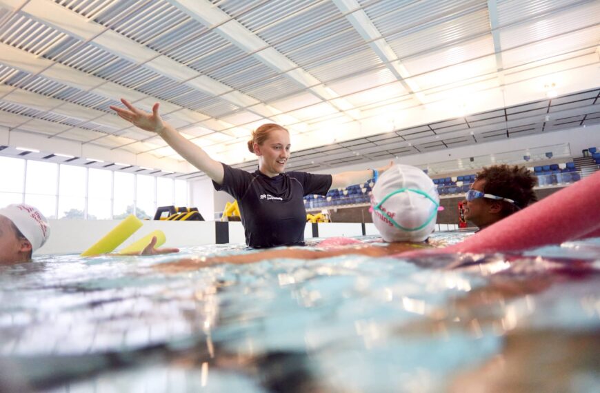 Institute of Swimming instructor teaching youngsters