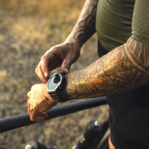 Cyclist wearing Amazfit smartwatch
