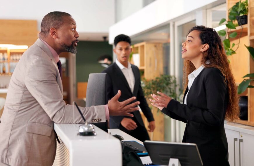 Businessman, woman angry argument for bad service at hotel