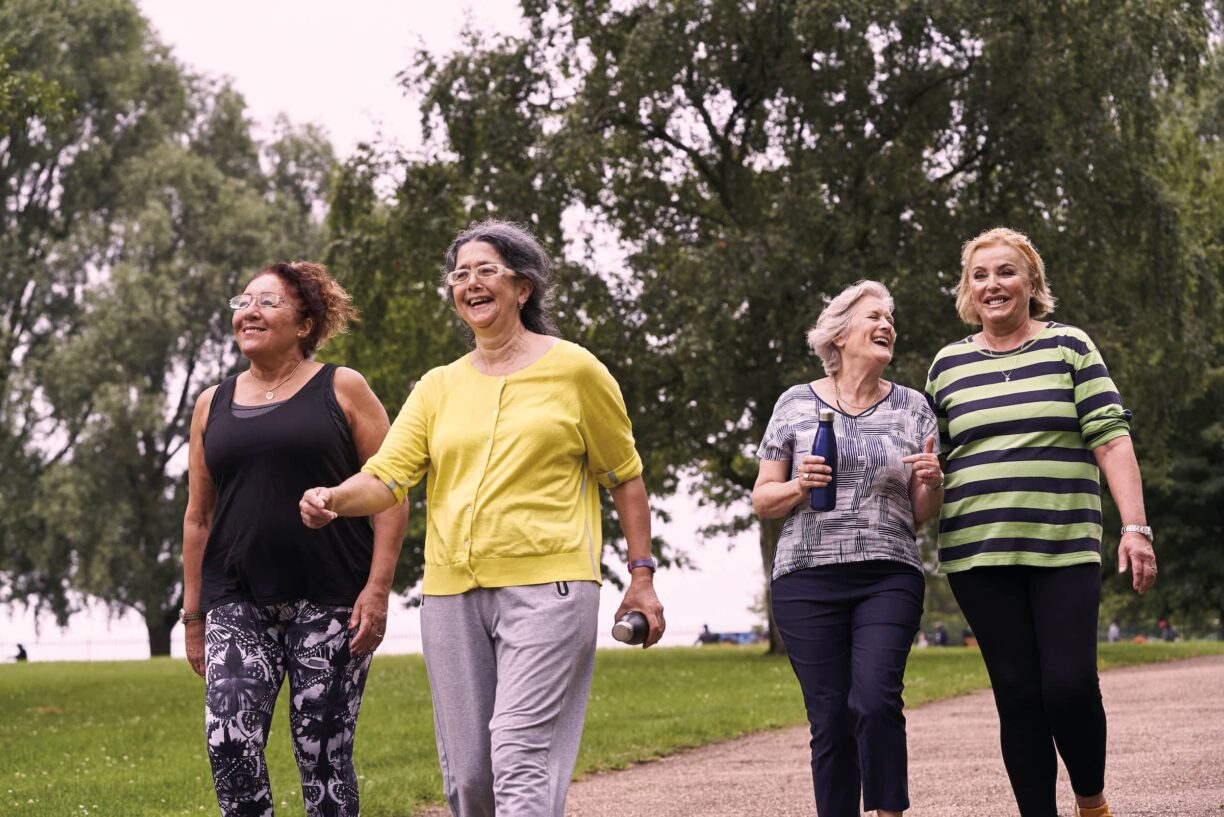 Four women walking