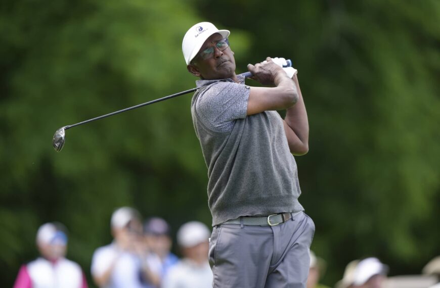 Vijay Singh hits his tee shot on the sixth hole during the third round of the Senior PGA Championship at Congressional Country Club