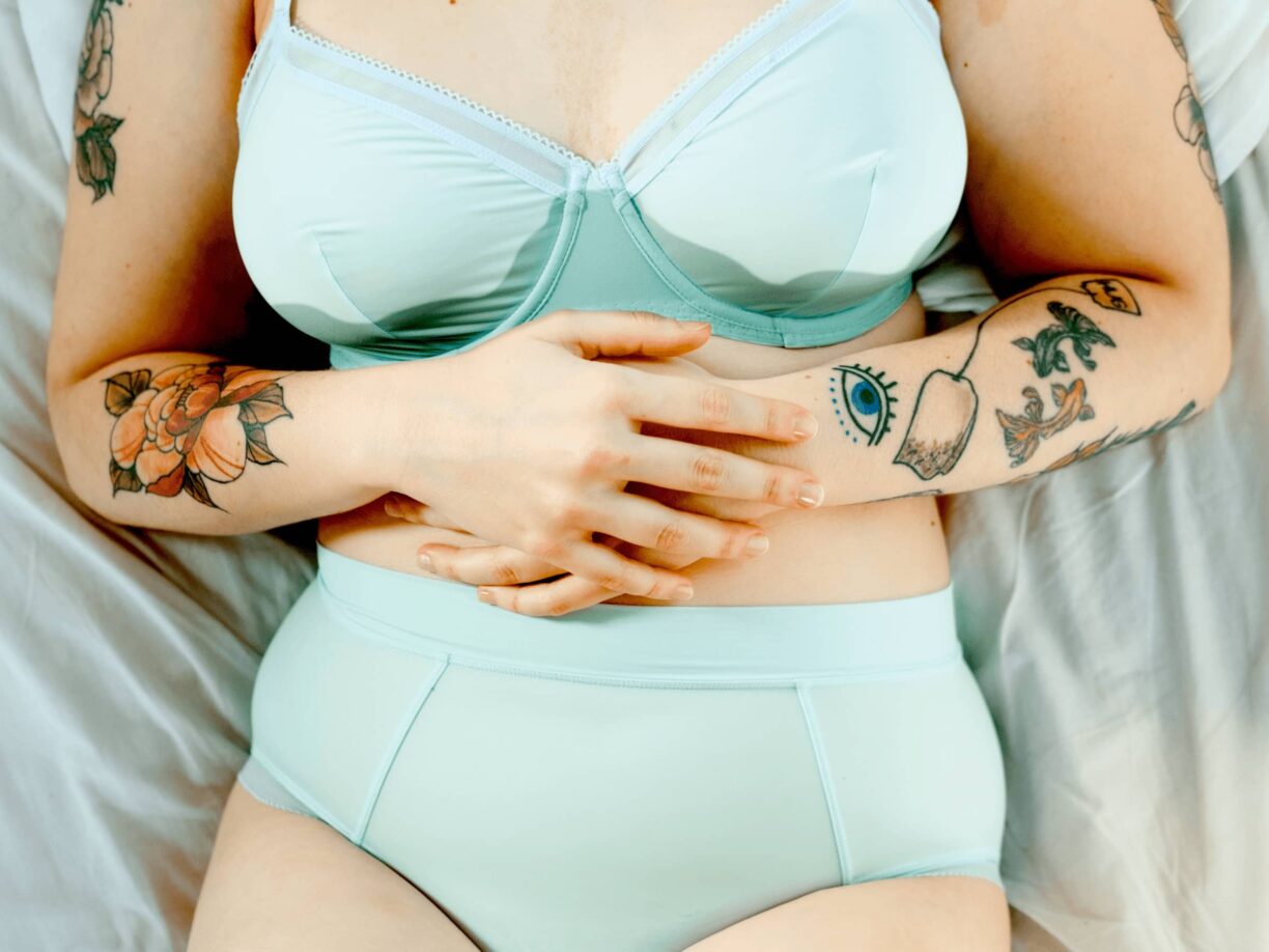 Woman with sweat under her bra