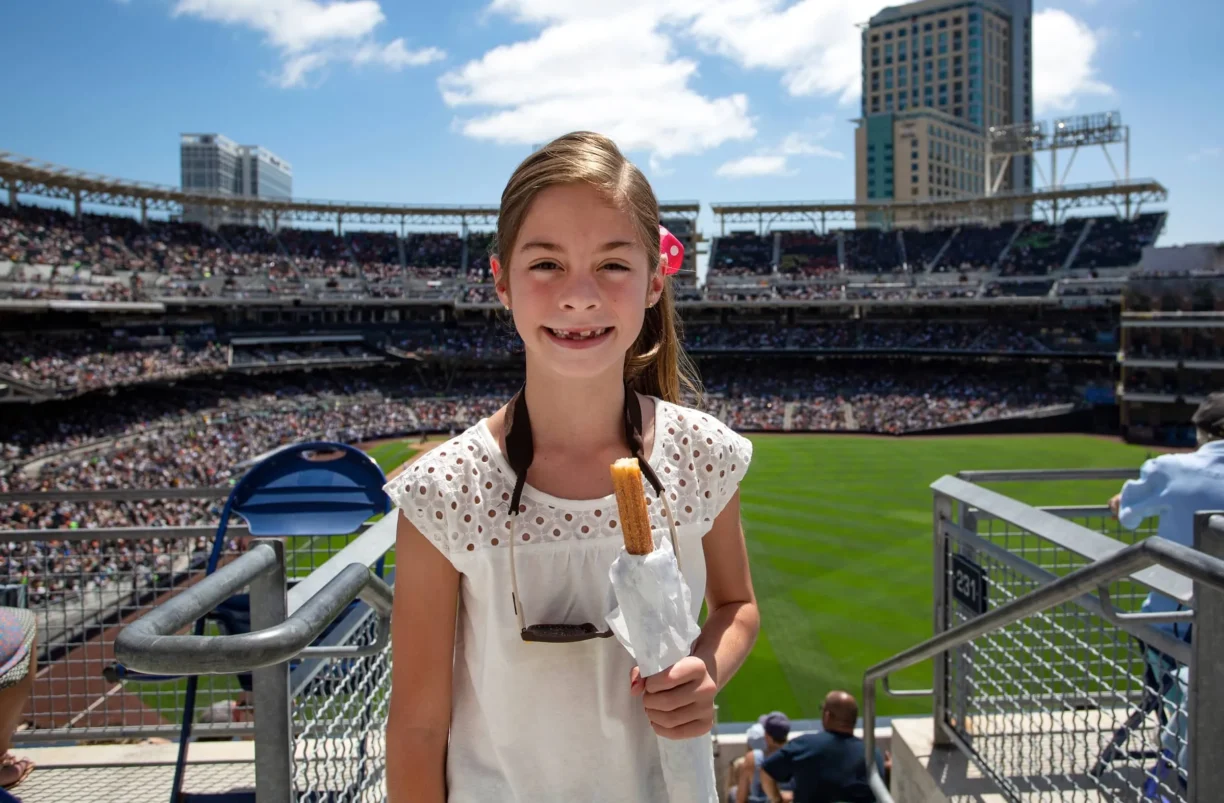 Young Girl attending her first professional baseball game