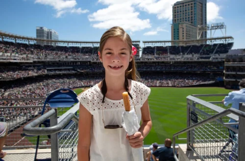Young Girl attending her first professional baseball game