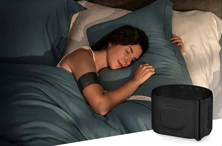Person Sleeps Wearing Garmin Sleep Monitor Band