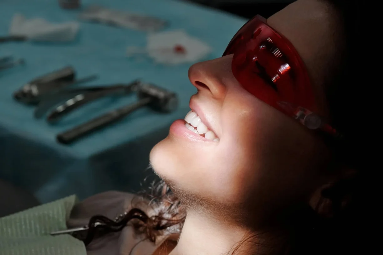 Woman smiles in dentist chair
