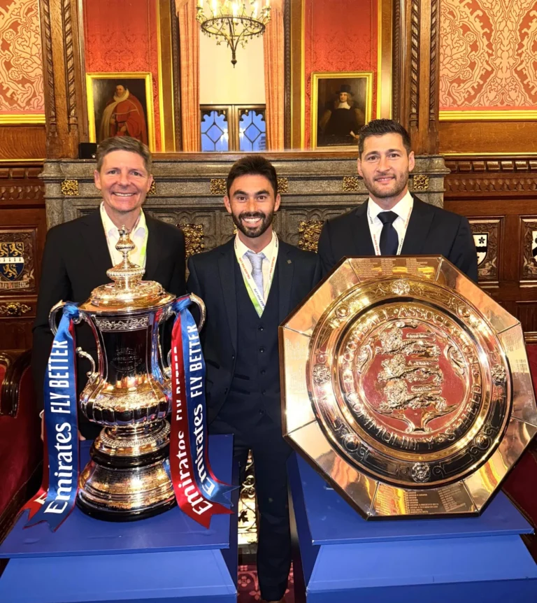 Matt Thacker with FA Cup and Charity Shield