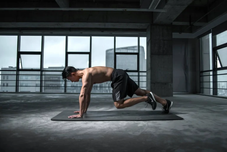 a man working out and thinking about how strength training supports mental health