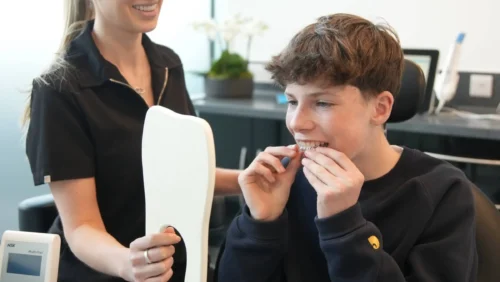 Young person tries he's Invisalign