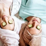 Two girls make homemade face and hair beauty masks