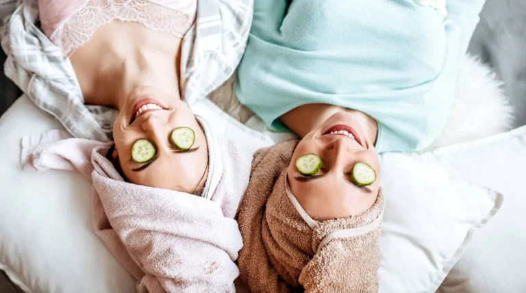 Two girls make homemade face and hair beauty masks
