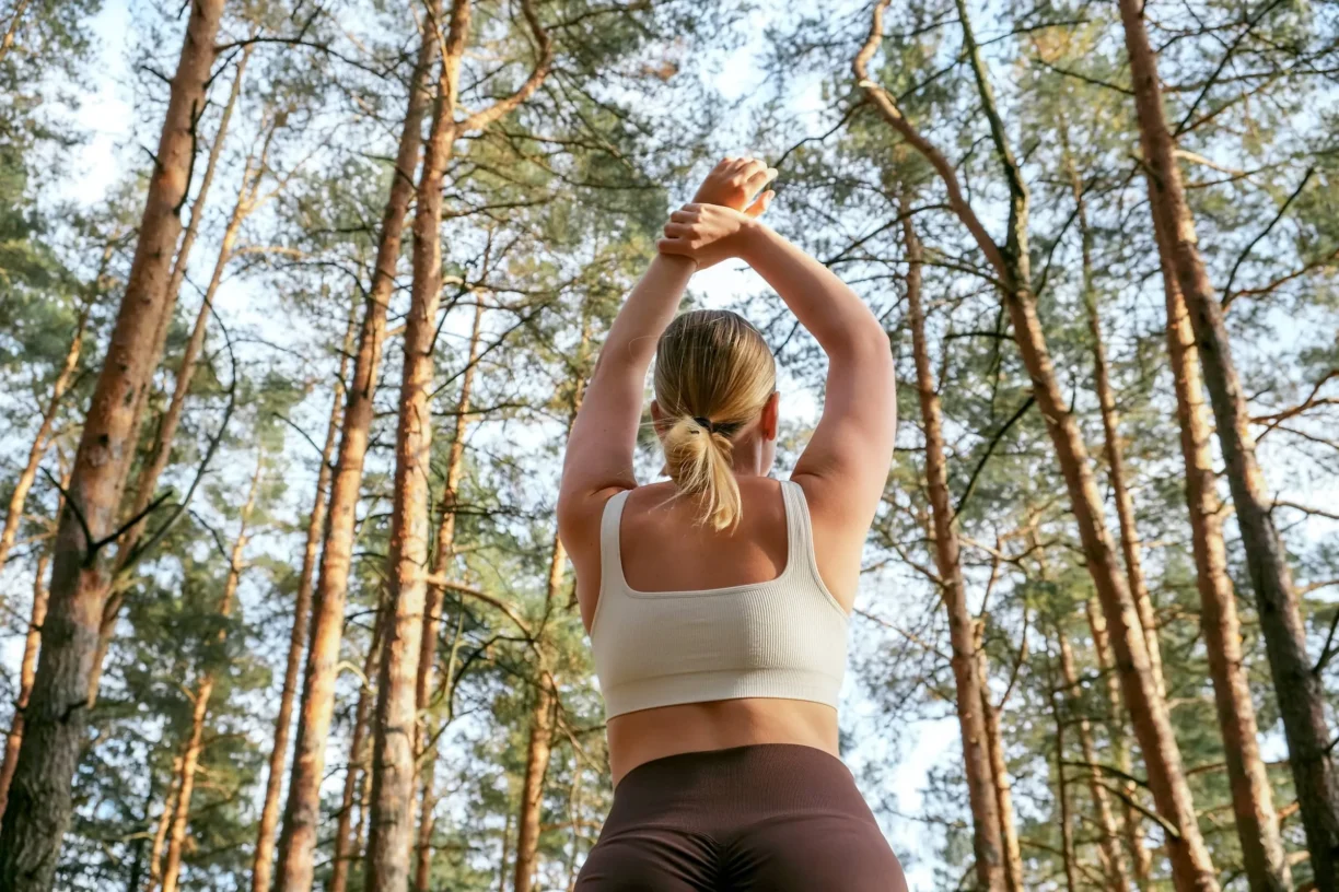 outdoor yoga in a pine forest