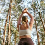 outdoor yoga in a pine forest