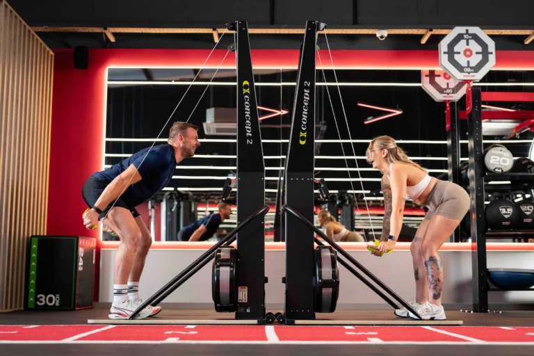 Couple of fitness people in gym