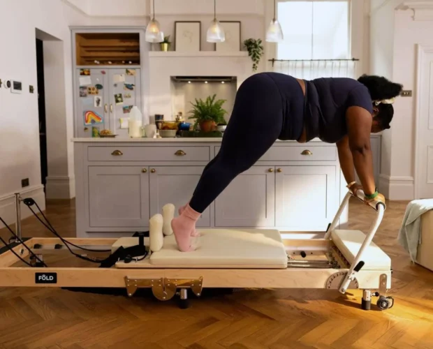 Person using FOLD Reformer