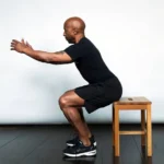 Wayne Leal performs a squat