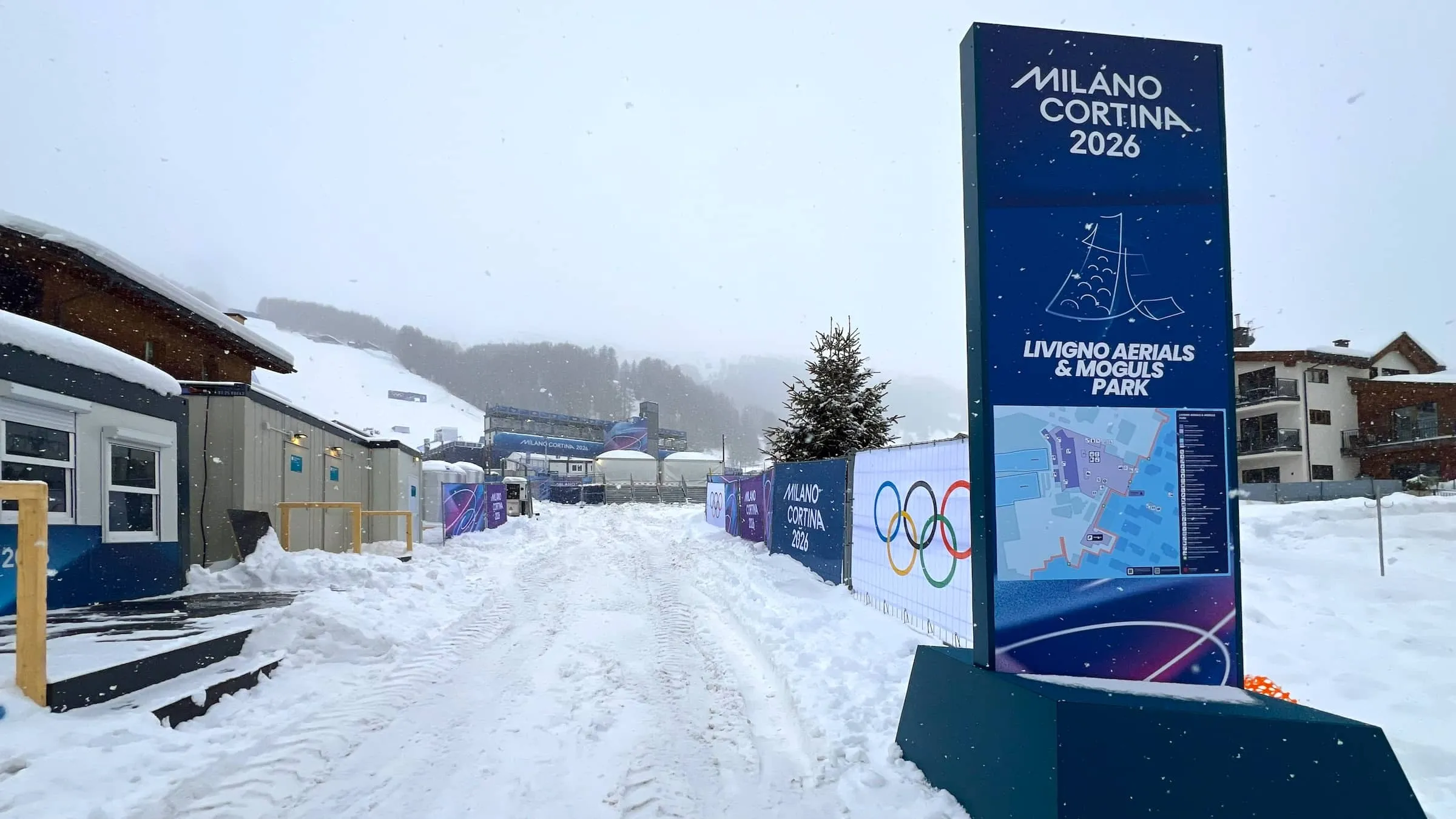Milano Cortina 2026 Winter Olympics sign at Livigno Aerials and Moguls Park one