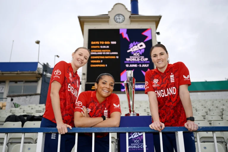 England Captain Nat Sciver-Brunt (R), Sophia Dunkley (C) of England and Lauren Filer of England pose with the ICC Women's T20 World Cup Trophy and the Edgbaston scoreboard during a media event to mark 100 Days to Go until the opening match of the ICC Women's T20 World Cup, at Edgbaston