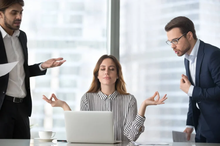 Calm female managing stress at workplace