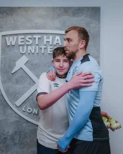 Jarrod Bowen hugs superfan Freddie
