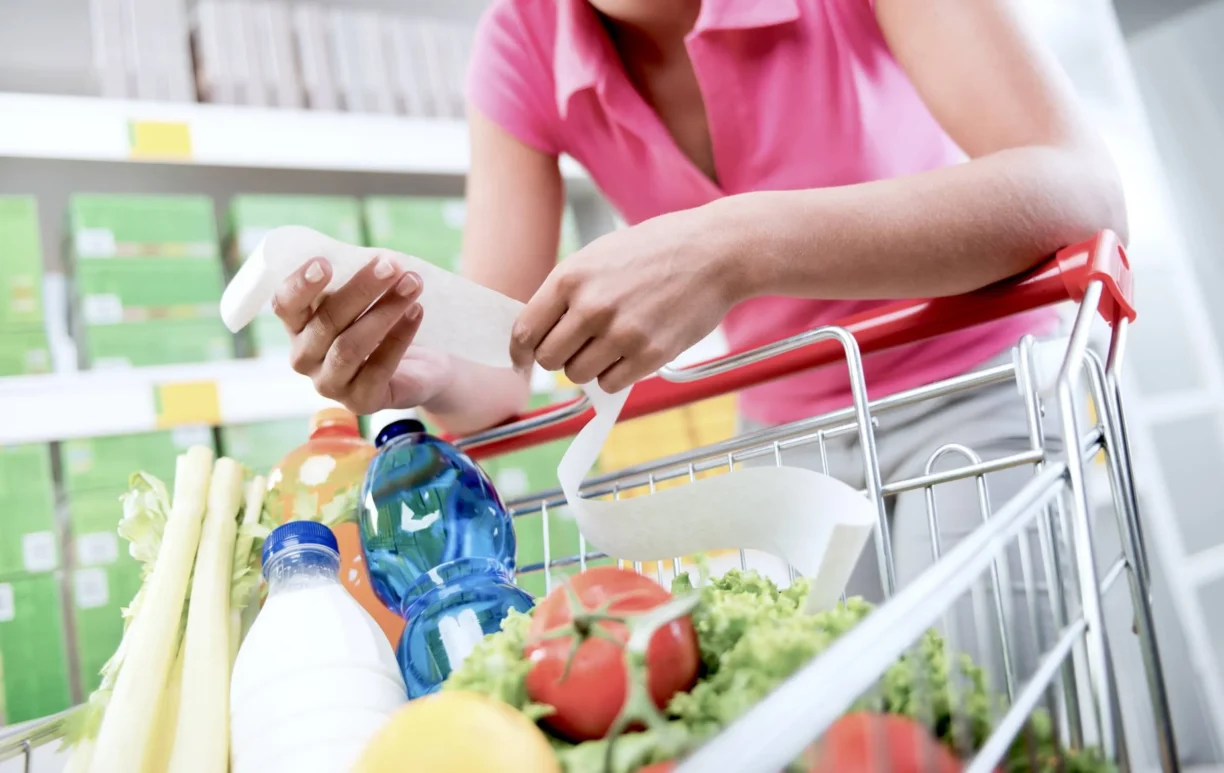 Person checks their shopping list